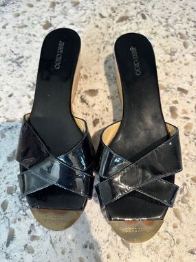 Jimmy Choo Black Patent Crisscross Slide Mules with Gold Toe Plate